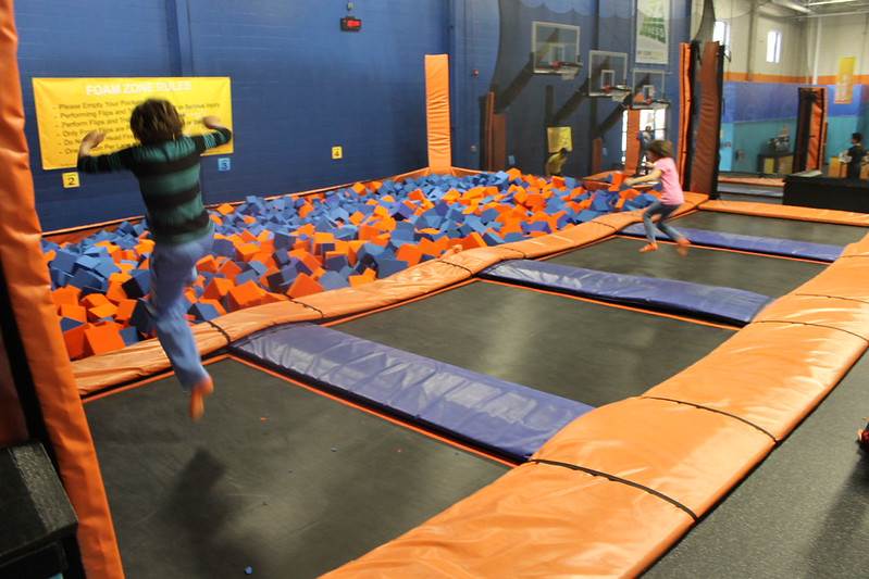 kids on an indoor trampoline